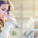 woman-drinking-water-1296x728