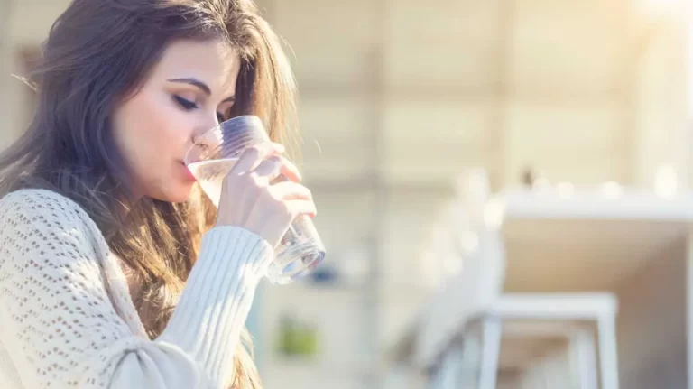 woman-drinking-water-1296x728